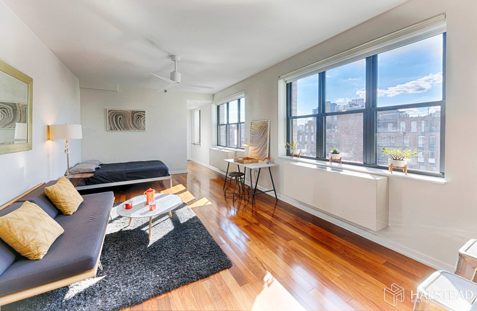 Step into this mint and brilliant penthouse studio with striking bright and sunny views.