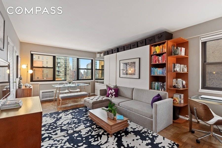 JUST BACK ON MARKET ! This Designer co op Studio with open NYC views is move in ready !