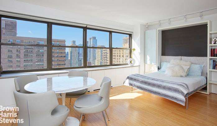 Perched on the 27th Floor, this sun flooded and designer renovated alcove studio is not to be missed.