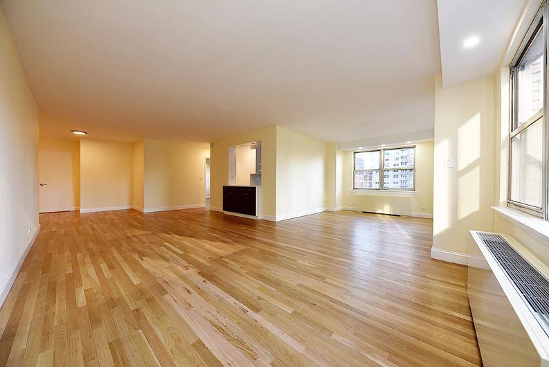 No fee ! What does this enormous L shaped, one bedroom apartment have other than the ability to convert to a two bedroom easily ?