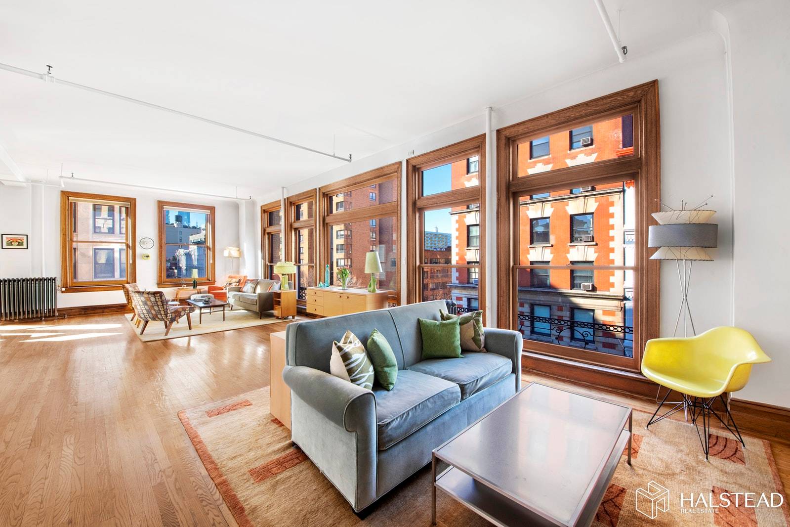 Enjoy brilliant light and open views from 16 oversized windows in this sprawling 2, 200 square foot Prewar loft located right at the crossroads of Soho, Noho and Greenwich Village.