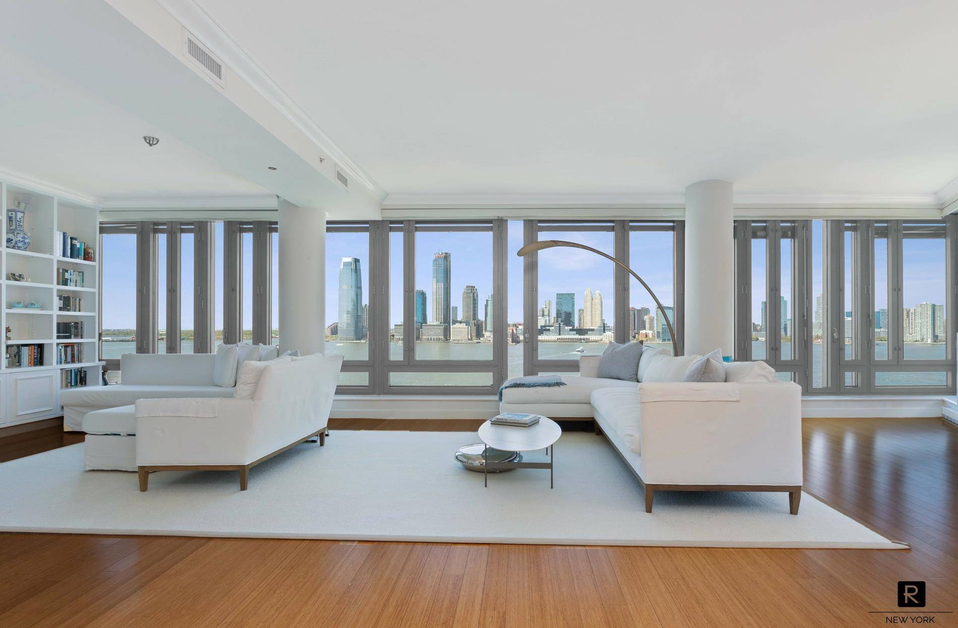 Sprawling three bedroom three bath apartment in the Riverhouse, the only LEED certified green condominium in North Battery Park West Tribeca.