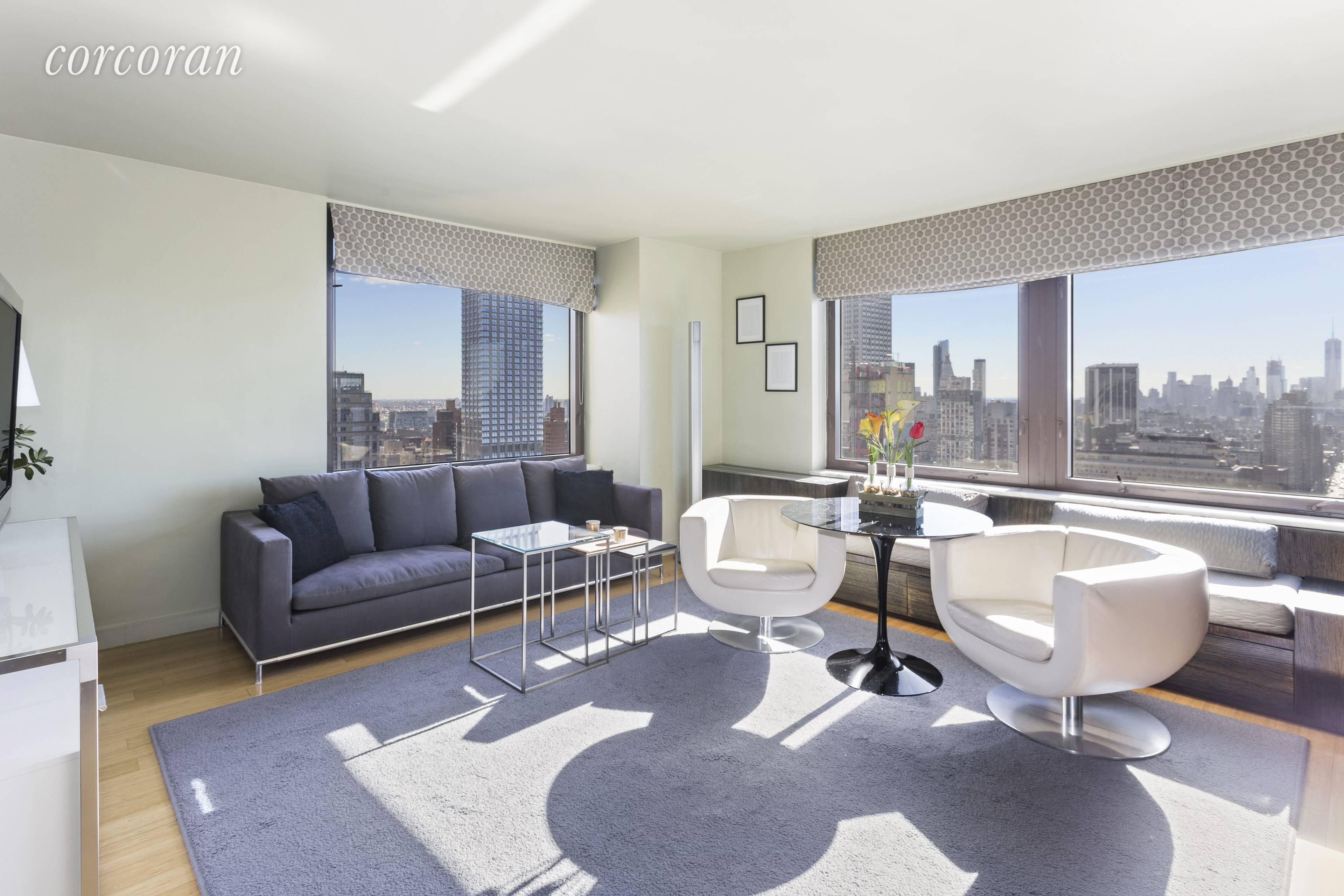 Sun blasted Bryant Park Alcove Studio FULLY FURNISHED Apartment 42 G is a splendid high floor customized, over sized corner unit alcove studio with magnificent unobstructed S E W views ...
