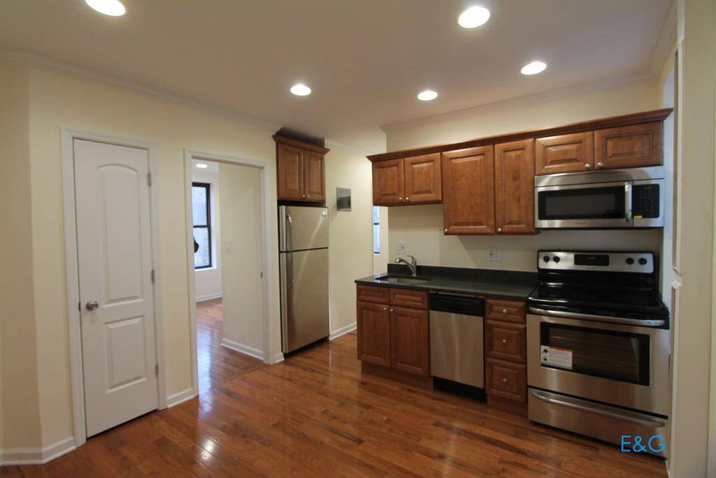 Newly Renovated Small 3 bedroom apartment No Fee located on the 3rd floor walk up.