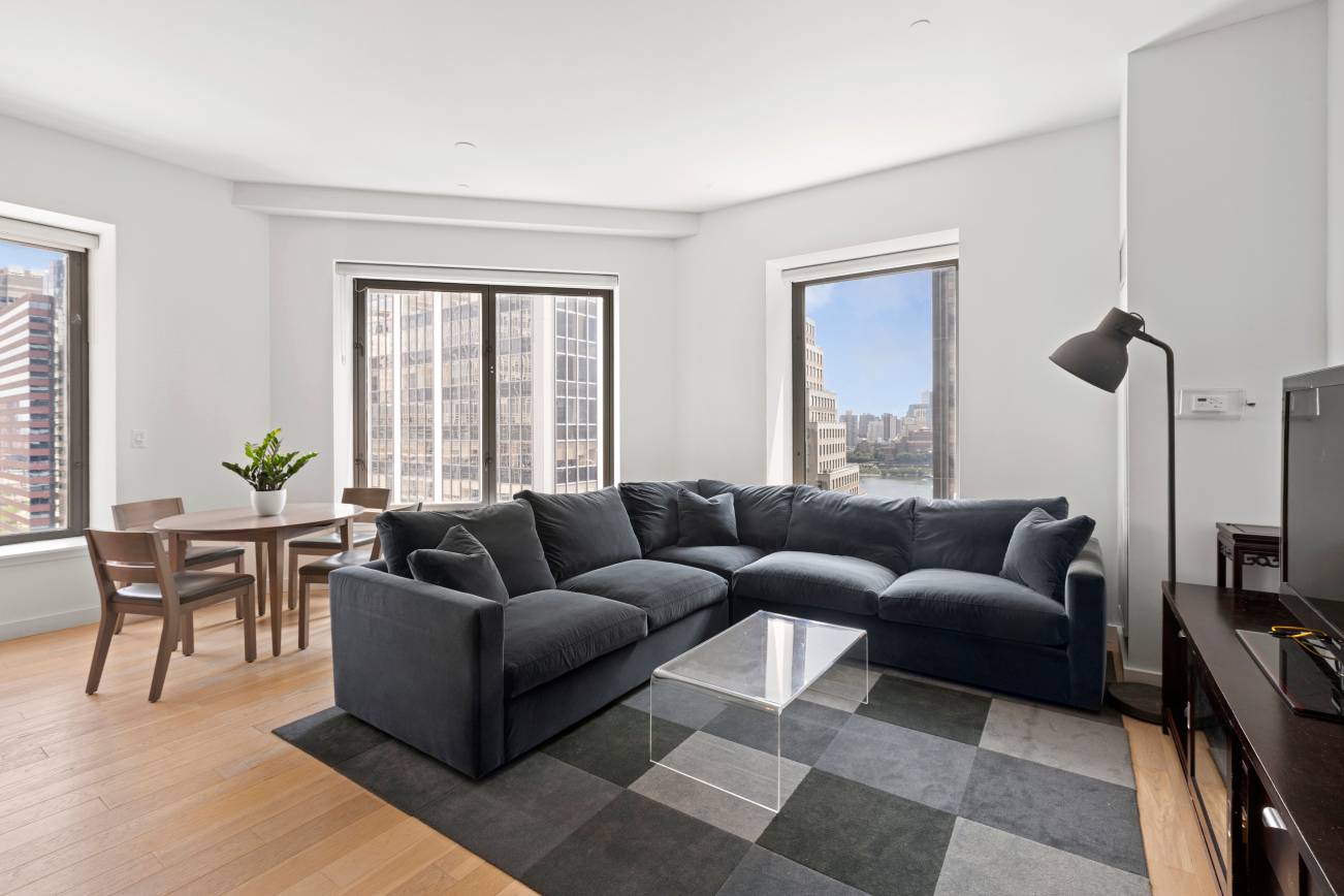 Welcome home to this beautiful, large, split two bed, two bath corner unit located in one of Wall Street s most desirable buildings designed by the award winning Rockwell Group.