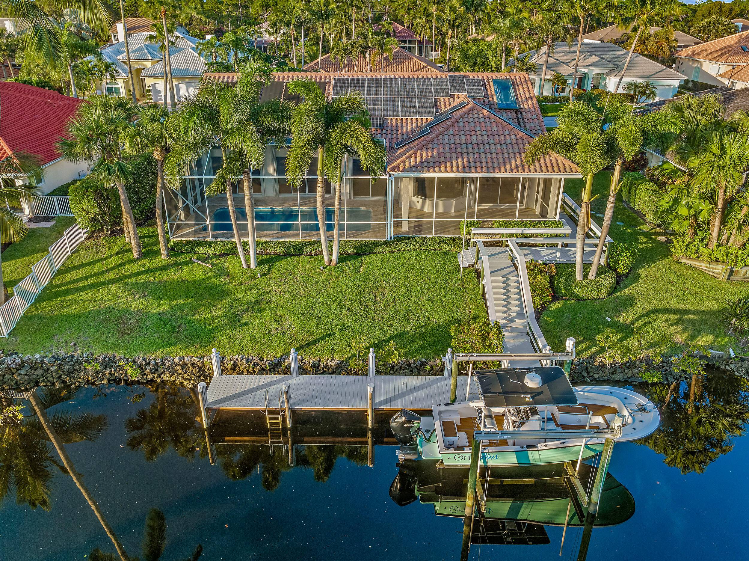 Welcome home ! This gorgeous waterfront estate has been completely gutted and remodeled from top to bottom.