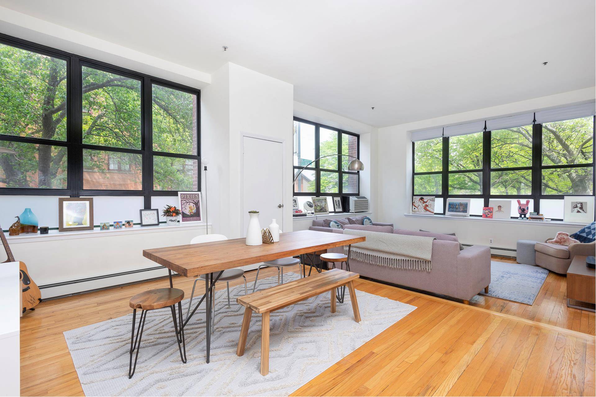 Glorious light fills your home from enormous windows in this spacious and renovated 2 Bedroom, 2 Bath Loft like Coop at the Clinton Mews.