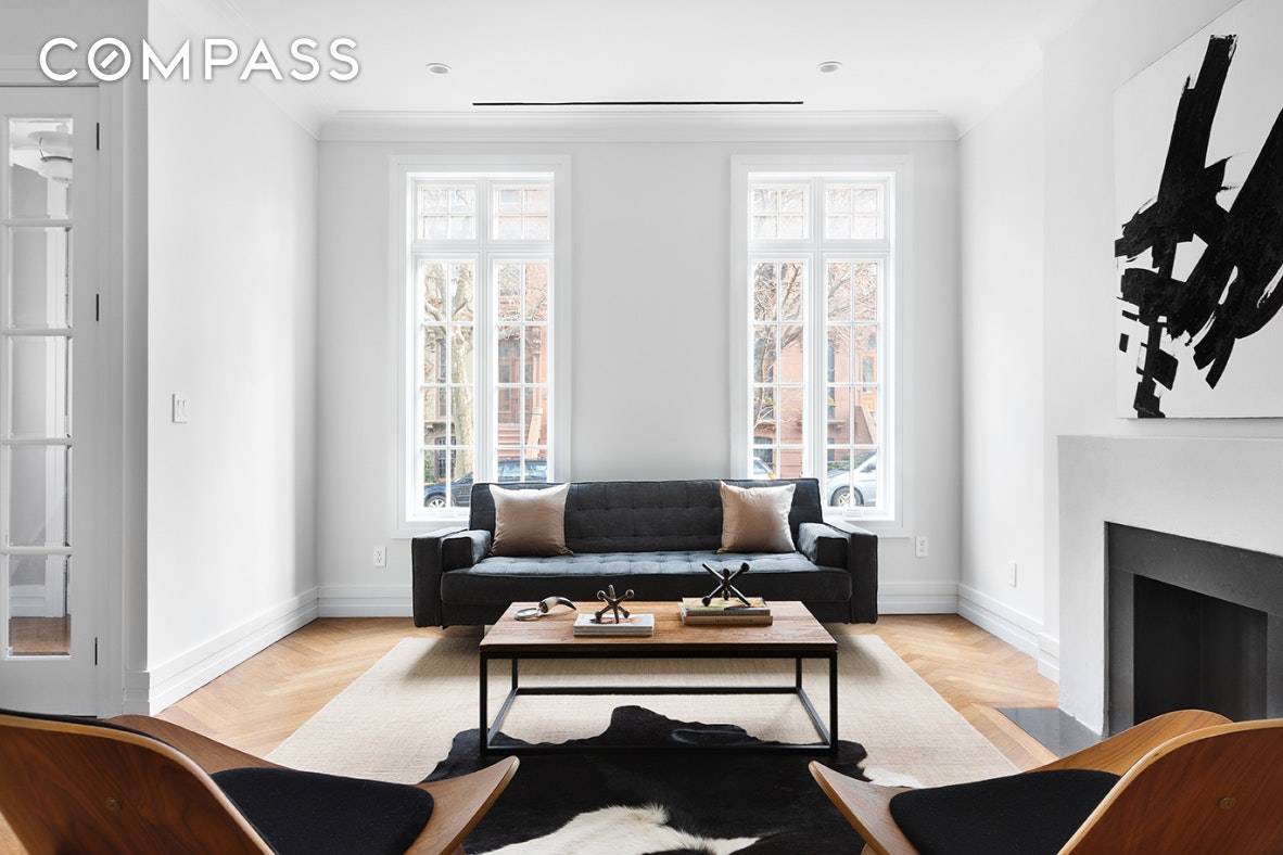 With a stunning facade worthy of a film set, and constructed in 1870, this finely renovated landmarked home offers the perfect combination of contemporary and historic.
