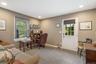 Office space with recessed lighting and light tile patterned floors