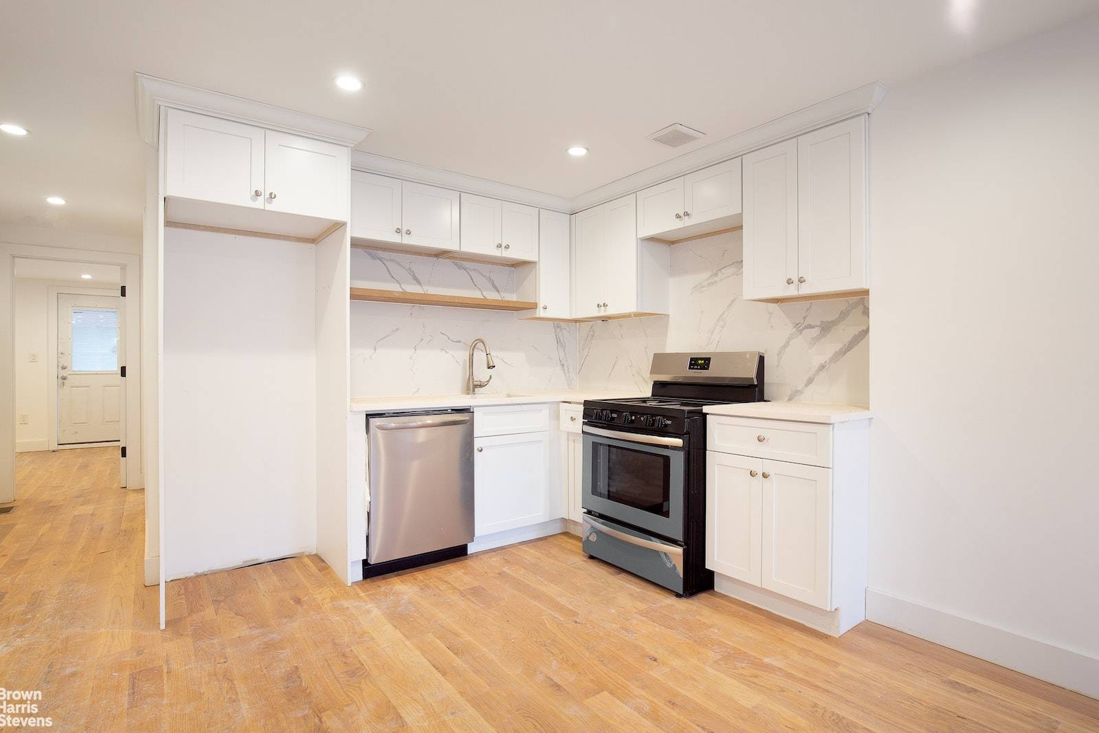 Renovated 3 bedroom, 1. 5 bathroom duplex with private patio on a townhouse block in Bushwick.