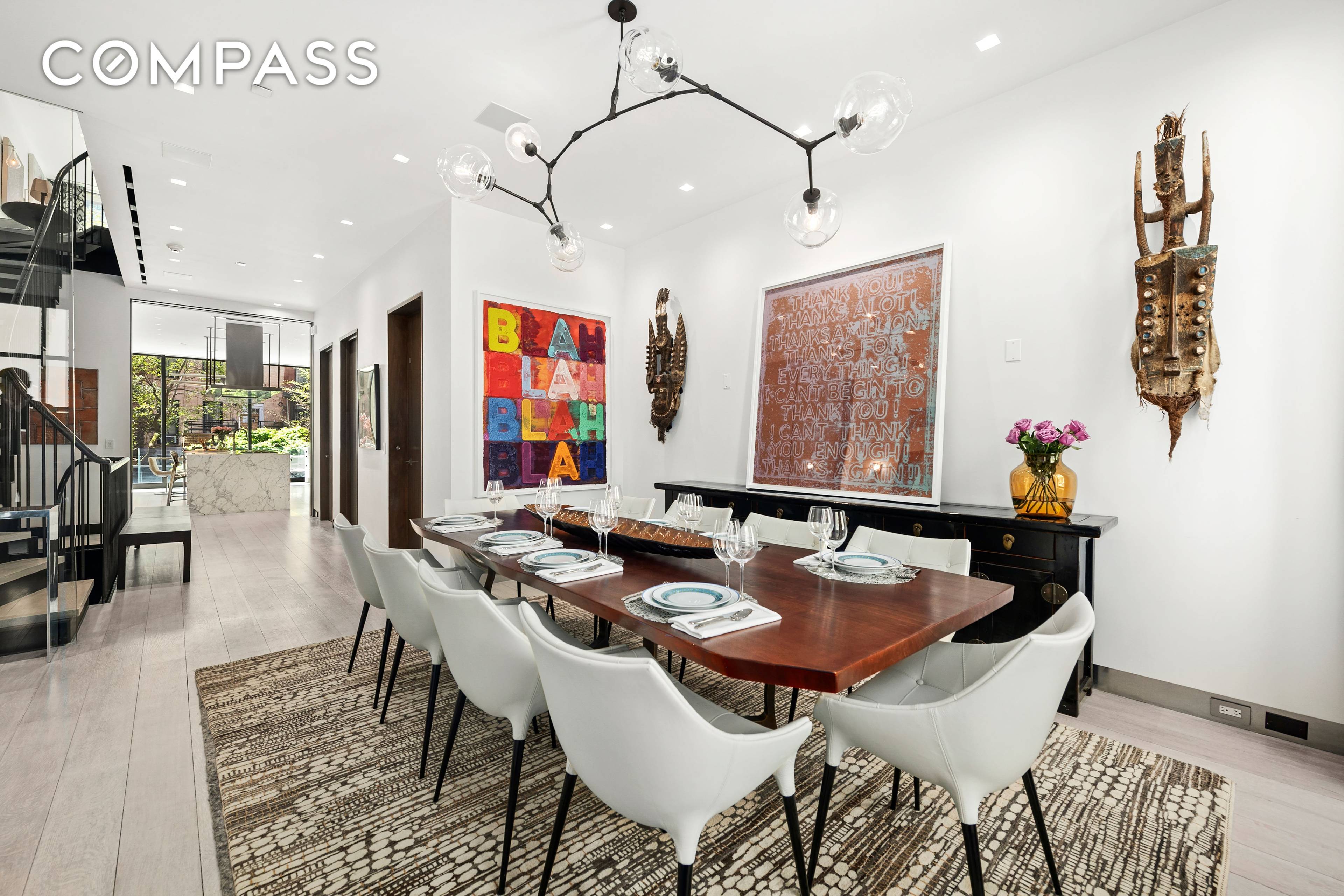 Located on a tree lined block famous for its exquisite townhouses, this contemporary, light filled six story home presents the ultimate in luxury living.