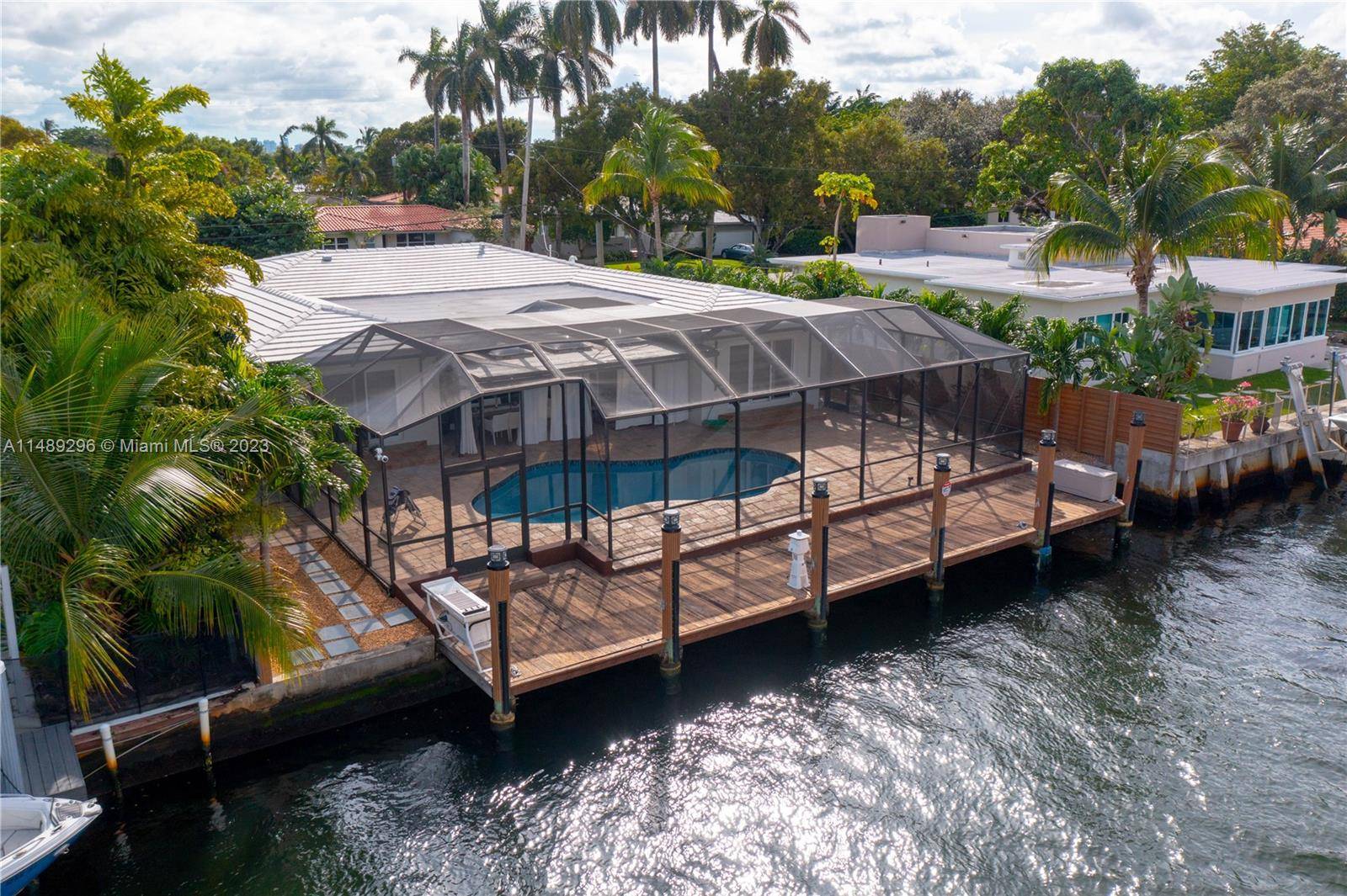 Experience waterfront luxury in Miami Shores with this exceptional remodeled home situated along the canal in the coveted East of Biscayne neighborhood.