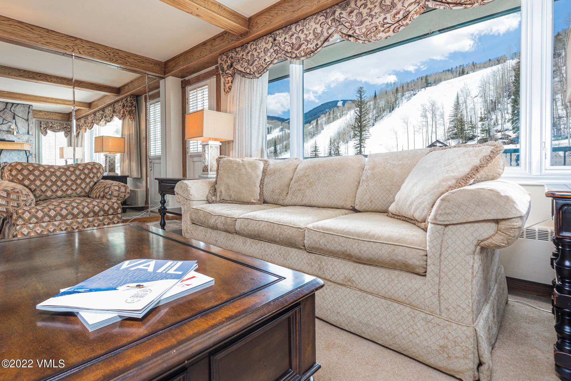 One of the best locations in Vail Village, this south facing three bedroom, three bathroom looks directly upon Vail mountain with an abundance of sunlight throughout the day.