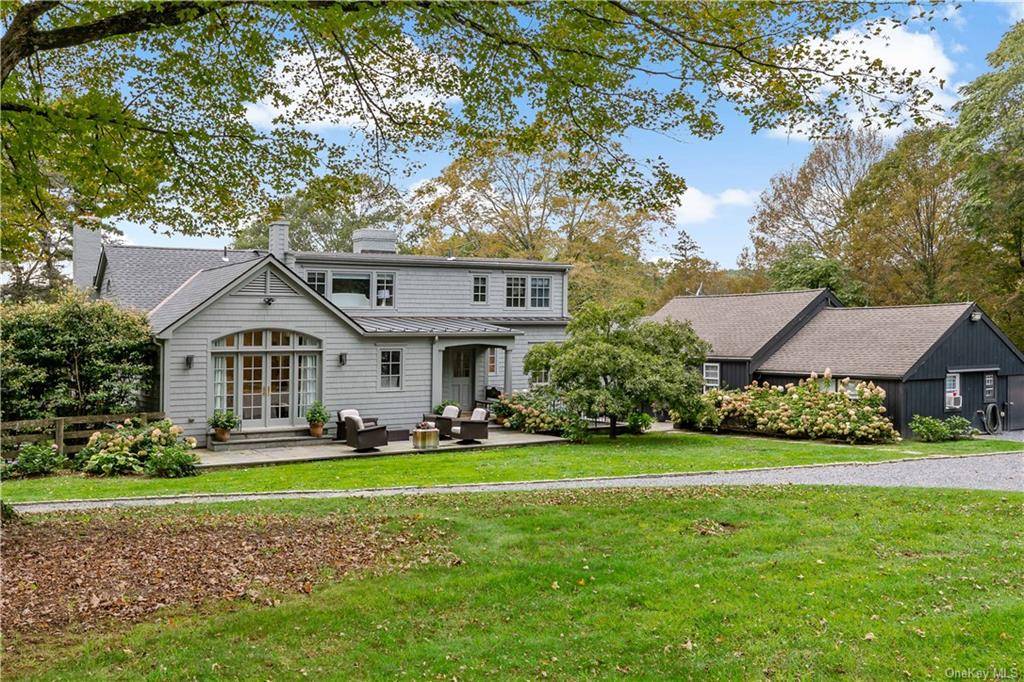 Welcome to Griffon Farm, a captivating mini estate nestled in the heart of Pound Ridge, approximately one hour from New York City.