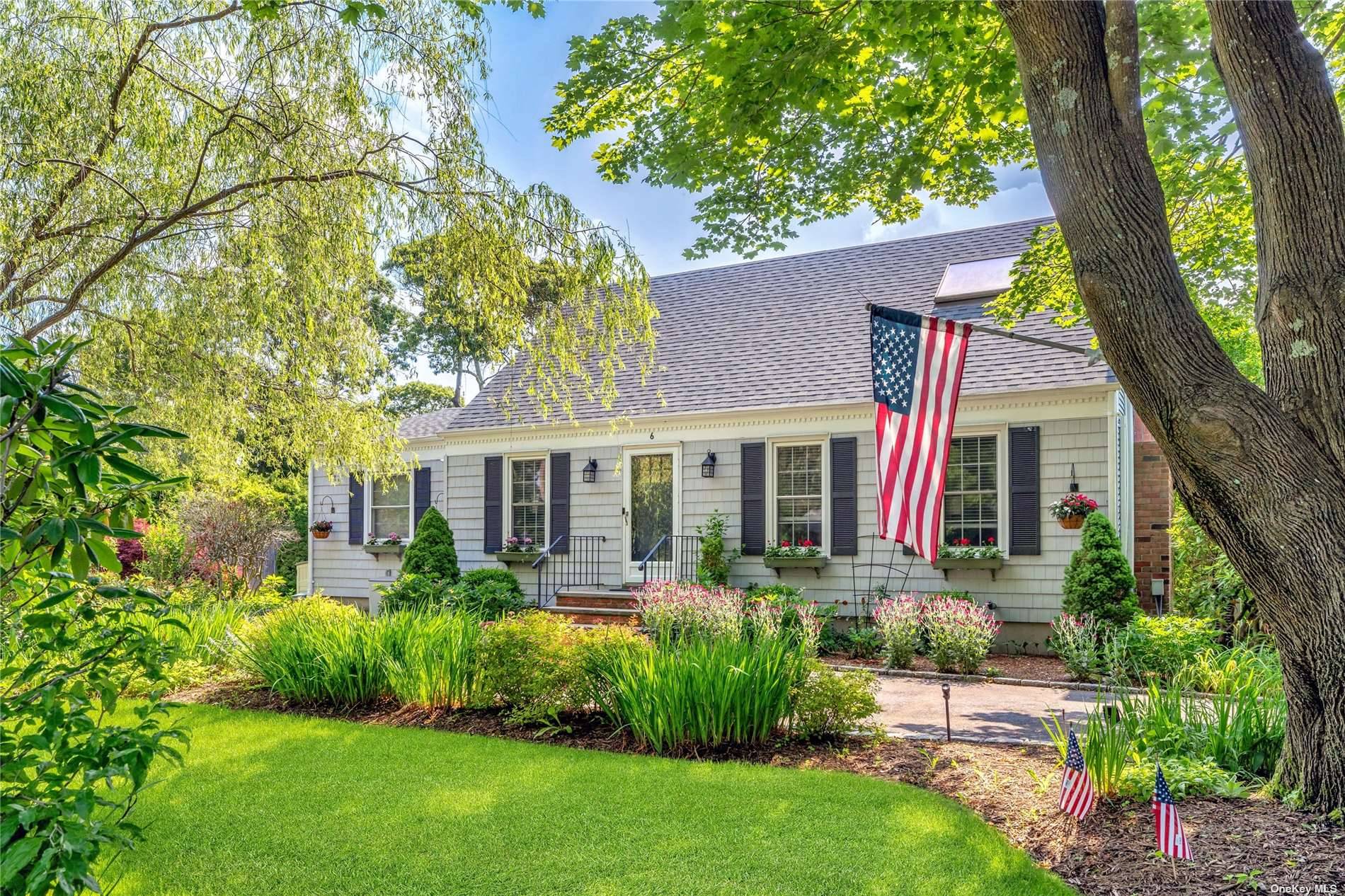 Spend your summer at this generous cape cod home with endless character located south of Montauk Highway in Remsenburg.