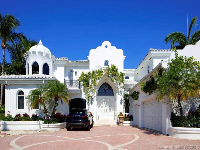 MEDITERRANEAN STYLE HOME ON THE INTRACOASTAL WITH A PRIVATE BOAT DOCK, OCEAN ACCESS.