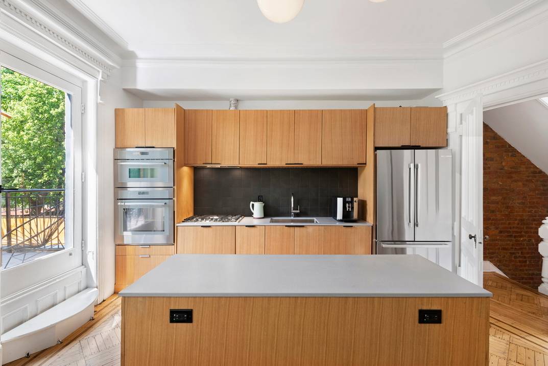 Designer Brownstone Modernist Style with Original Details Oversized Backyard amp ; Deck Manicured Garden Welcome to this design forward and fully gut renovated two family townhouse in prime Bedford Stuyvesant, ...