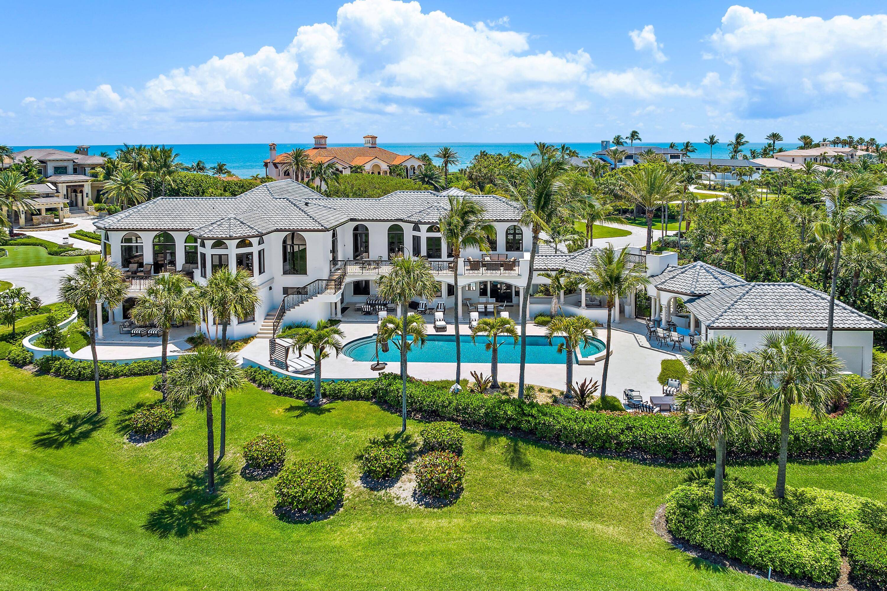 Nestled on one of the best lots in Sailfish Point designed to maximize panoramic views of Jack Nicklaus Signature golf course as well as lake ocean views.