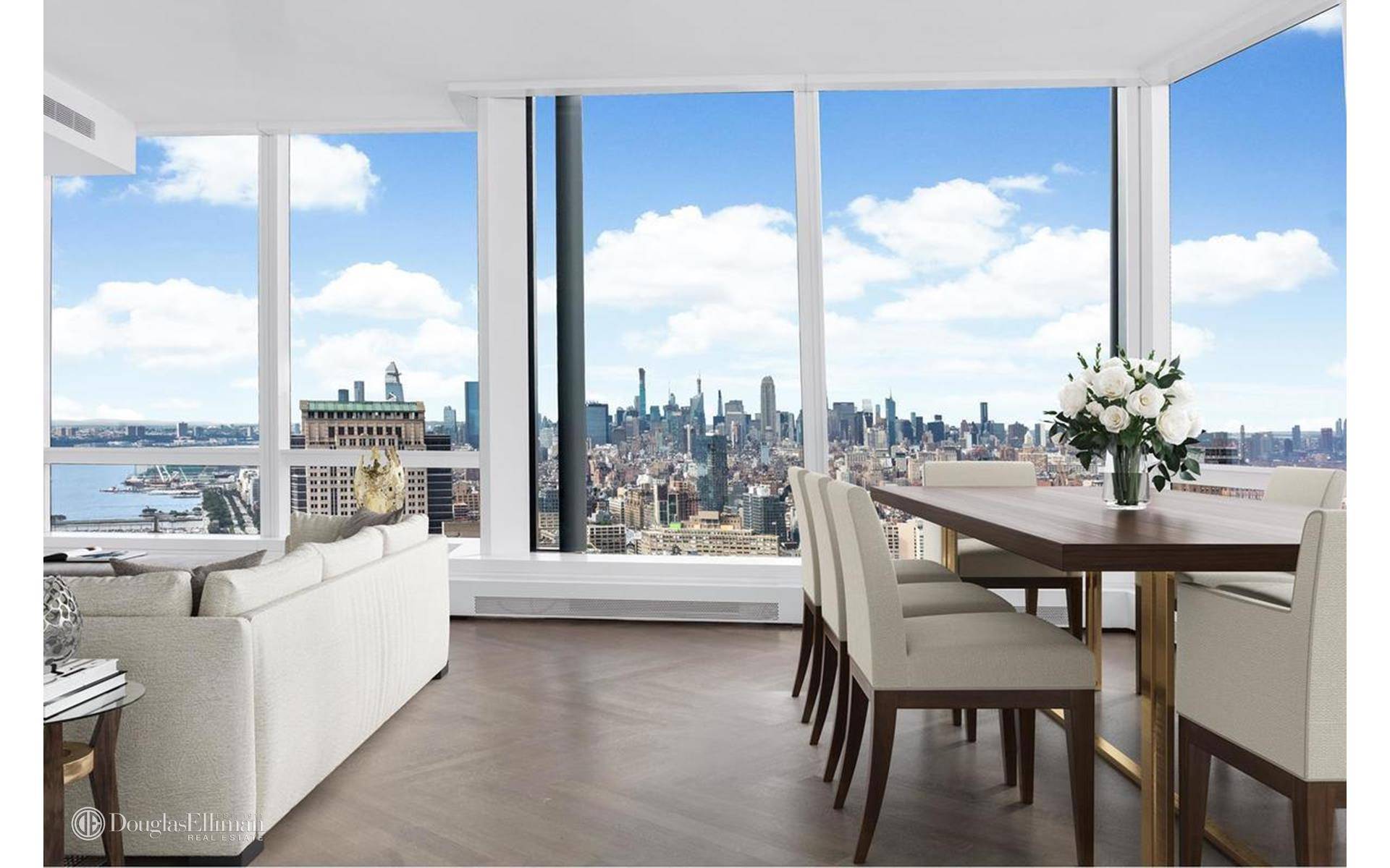 Sitting at the crossroads of downtown Manhattan and New York luxury real estate, this transcendent, 49th floor residence is like no other.