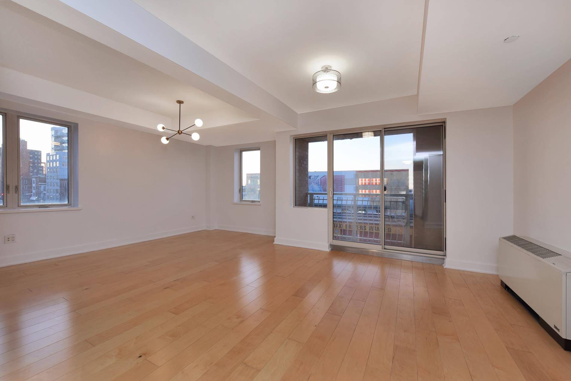 Beautiful Sunny Corner unit in the most sought after Full Service Condominium on 4th Ave Park Slope.