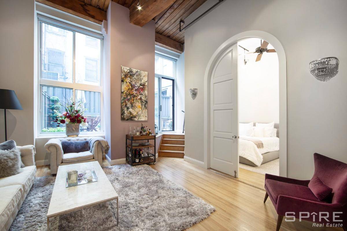 Situated in a converted 1920s brewery, this meticulously crafted two bedroom, one bathroom also offers a flexible loft space and private backyard.