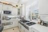 Kitchen w/Gas Cooktop & Warming Drawer