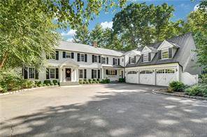 Pristine Colonial home nestled on 2.