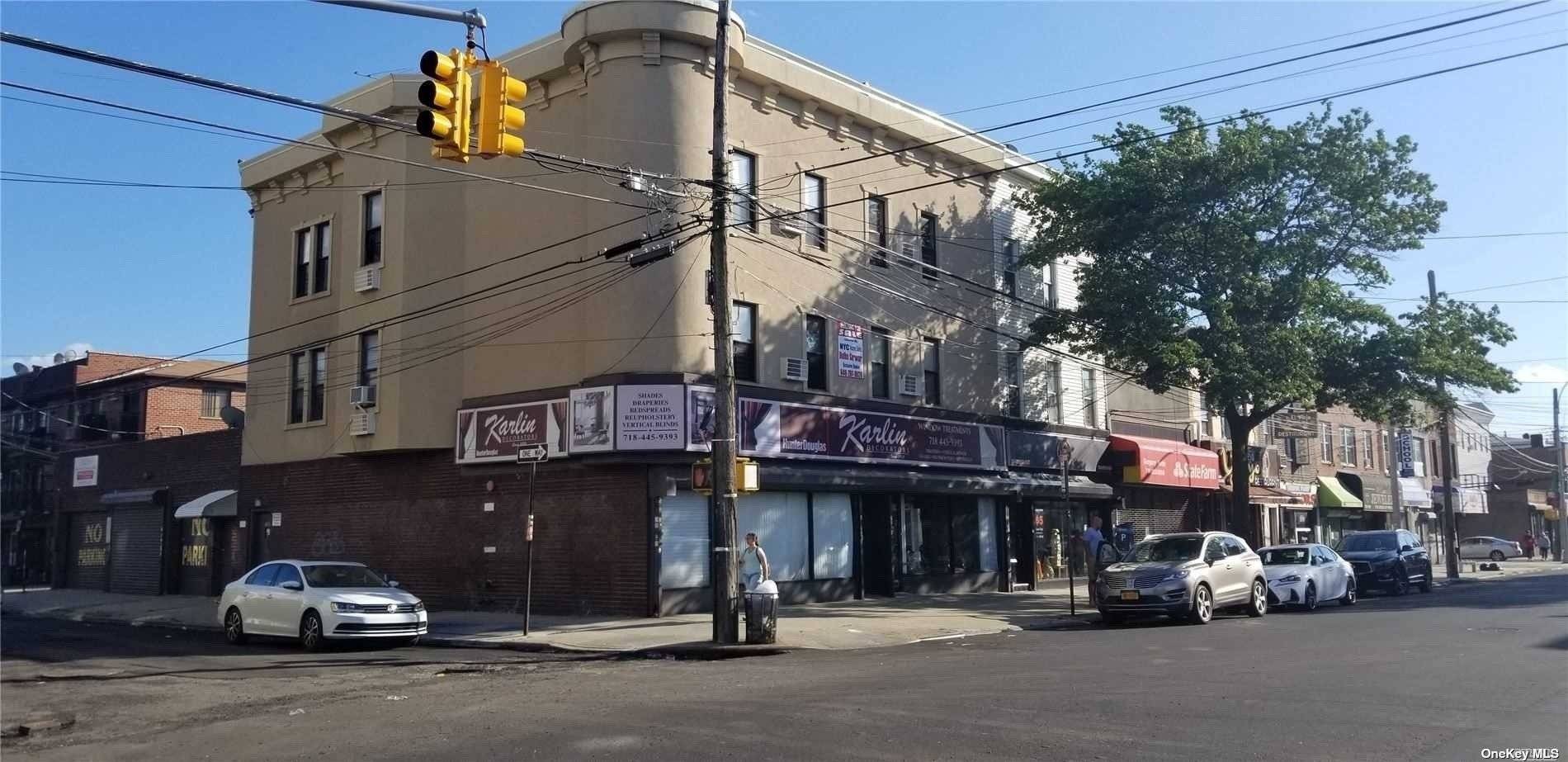 Mixed Use Property In Excellent Condition ; This Property Feaures1600 SQ FT Space In The Rear Of The Building With A Full Basement With Rollup Gates, Two Sore Fronts, and ...