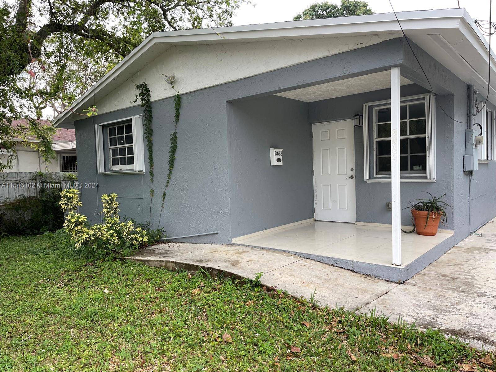 Great Investment property 3 bedroom 2bath home in Coconut Grove features open spaces, kitchen with quartz counter tops and stainless steel appliances.