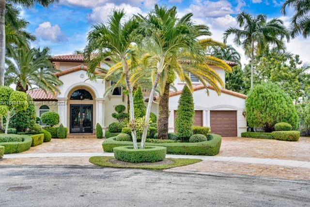 Beautiful Miami lakes home in beautiful SilverCrest lakes Estates sitting on a cul de sac on the lake with amazing views.