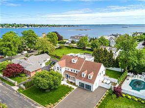 Like NEW fully furnished and equipped Shore Colonial with cool contemporary edge just over the Old Greenwich line in the Davenport Point Waterfront Assoc.