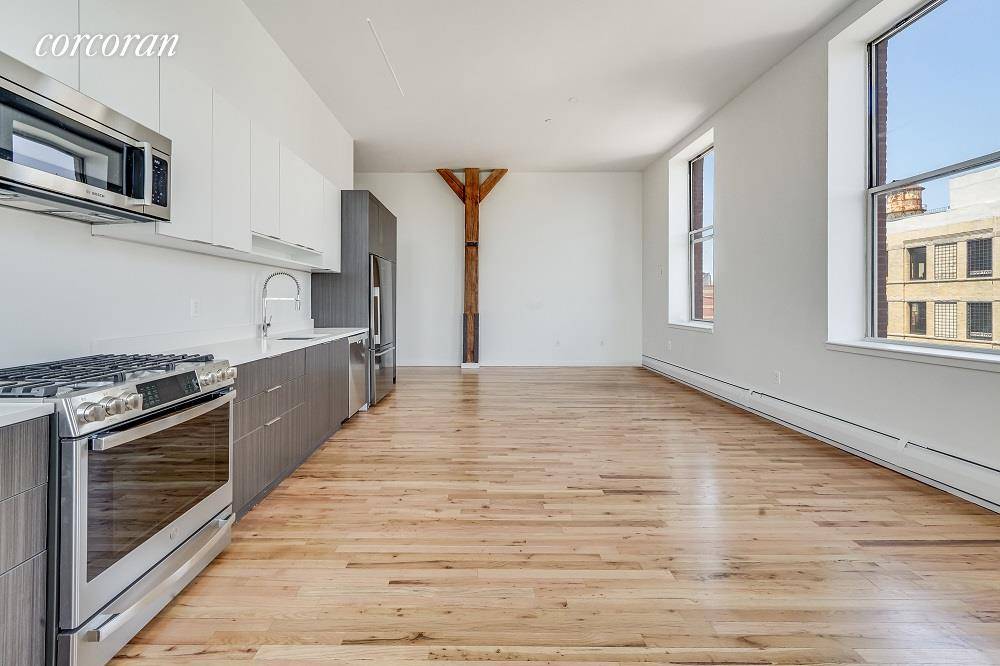 No Fee 1 month freeFully gut renovated 1100sf corner loft with original 1880 wood ceilingSunny eastern and southern exposure, 6 double closets and in unit Bosch washer and dryerKitchen stone ...