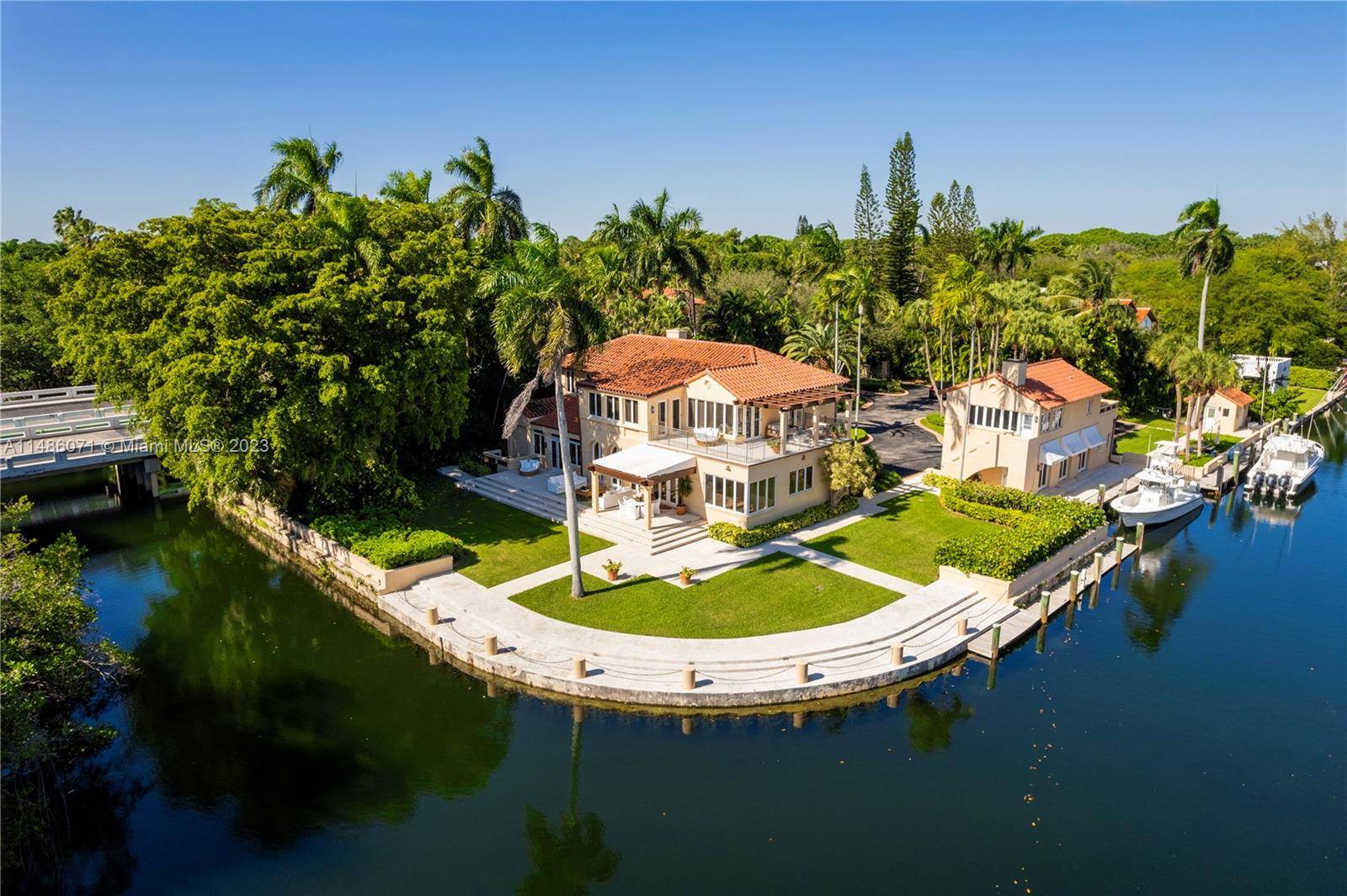 Introducing the pinnacle of waterfront living in this stunning Cocoplum, Phase 1 property, uniquely placed on an expansive 37, 500 sqft corner lot, that boasts approx 400 of water frontage, ...