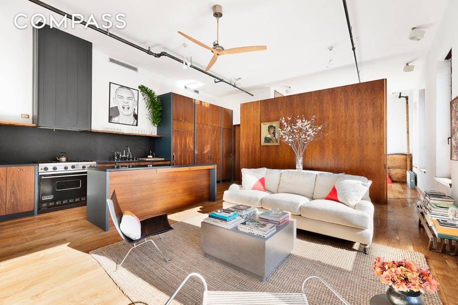 This designer renovated corner pre war condo loft with southern exposure, industrial character and clear views will astound you with its sheer volume of space.