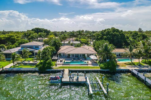 STUNNING WATER FRONT PROPERTY IN PRESTIGIOUS NEIGHBORHOOD OF MIAMI SHORES, SEATING RIGHT ON THE BAY FACING EAST OF MIAMI BEACH.