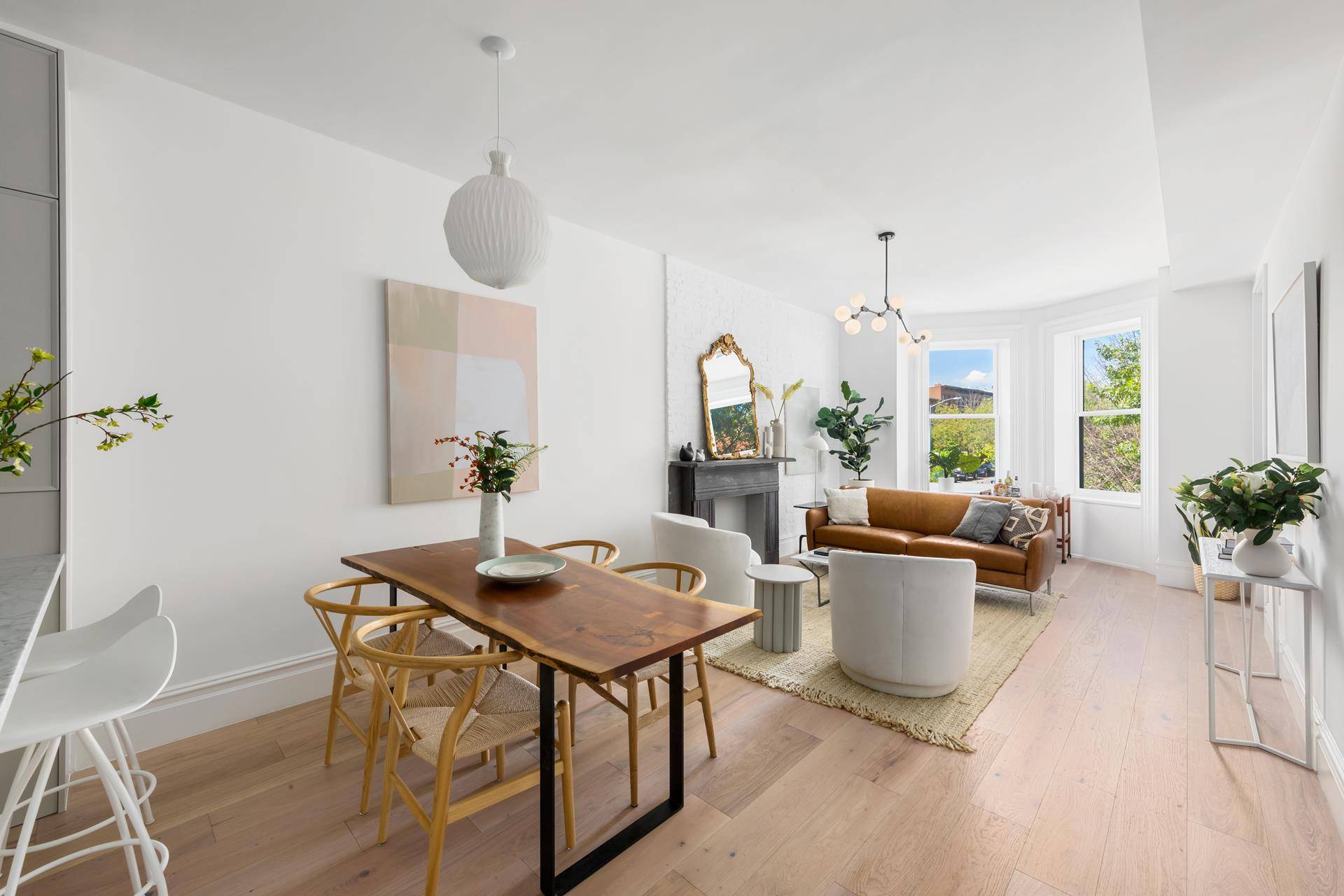 Nestled on a uniquely quiet and sunny block in Carroll Gardens 349 Hoyt Street is a historic brick building that has been impeccably reimagined as four new condominium homes.