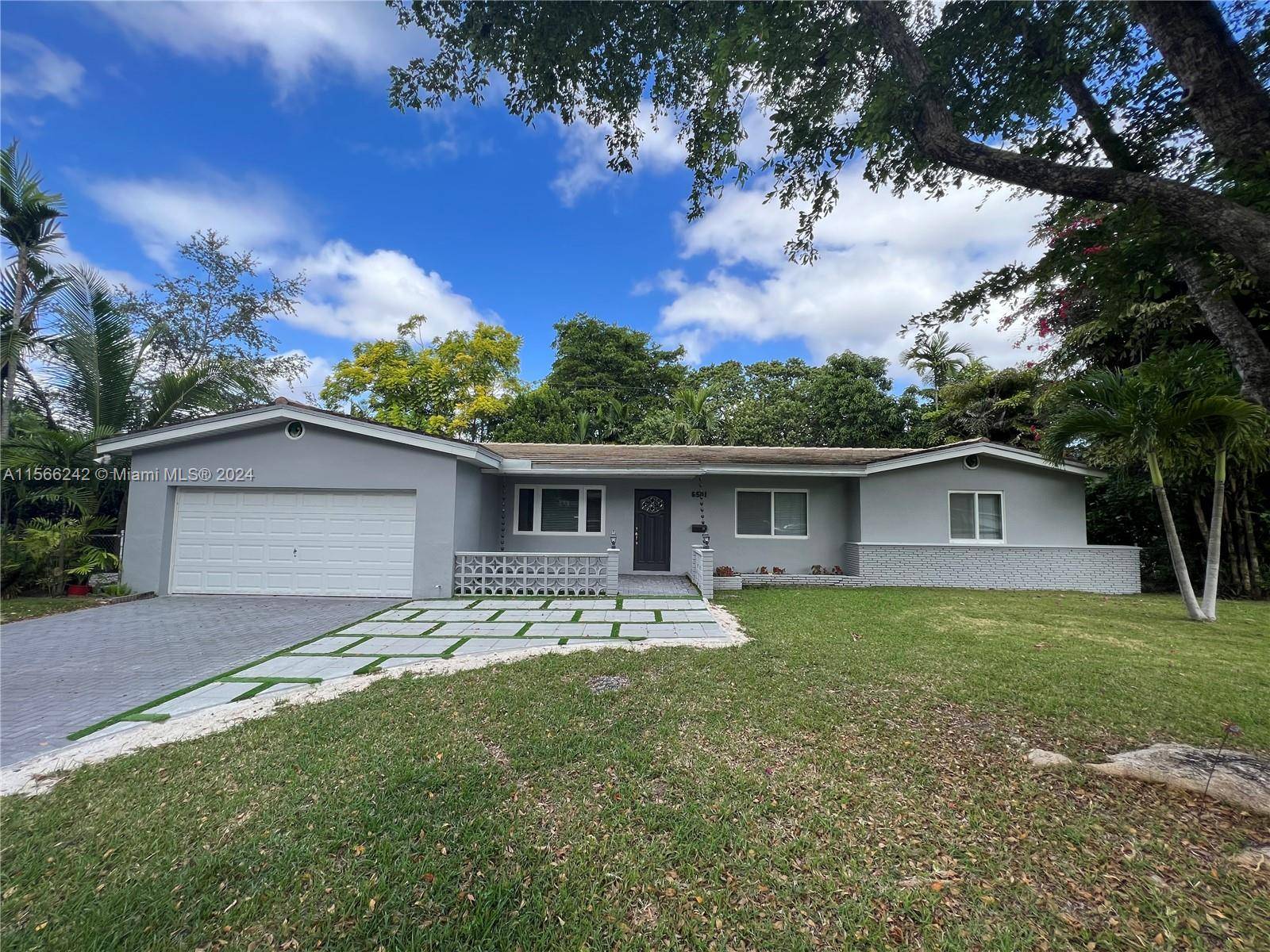 Spacious 3 bed 2 bath ranch home on a corner lot in South Miami.