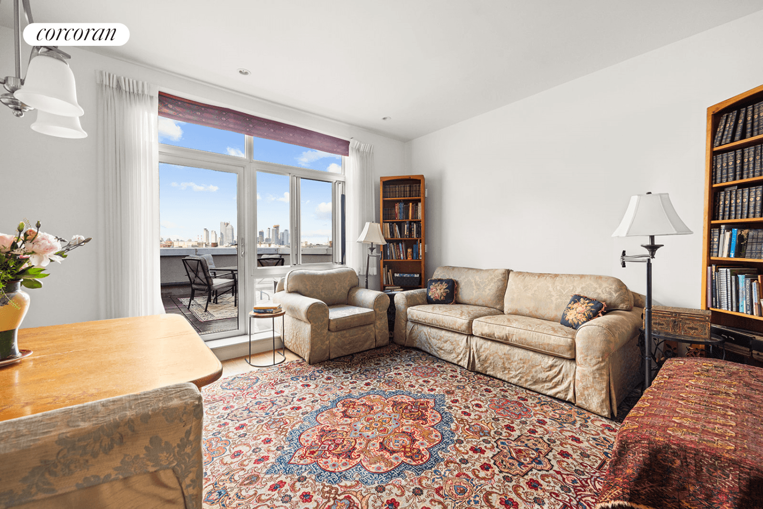 Welcome to your top floor oasis offering outdoor living at its finest with a spacious private terrace and sweeping views of the Midtown skyline and the iconic Empire State Building.