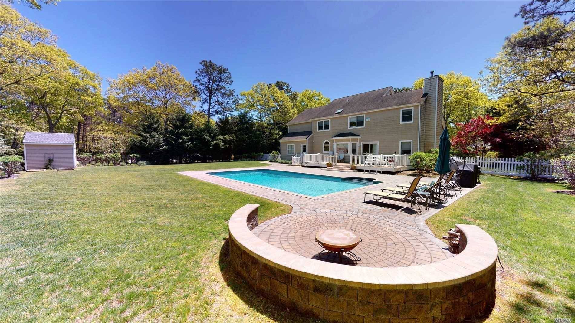 This 5 bedroom, 3 Bath completely updated Post Modern is the perfect Hampton's getaway.