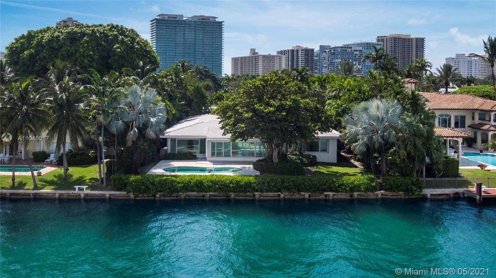 EXPERIENCE THE LUXURY, PRIVACY, AND SECURITY OF LIVING IN BAL HARBOUR ON A TROPHY RESIDENTIAL SITE ON THE WIDE OPEN BAY BY A TALIESIN OF LEGENDARY AND RENOWNED ARCHITECT FRANK ...