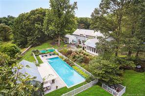 Greenwich CT PO, rural solitude meets high design in this perfectly maintained Conyers Farm haven, inclusive of three total structures and 11 acres of wooded land.