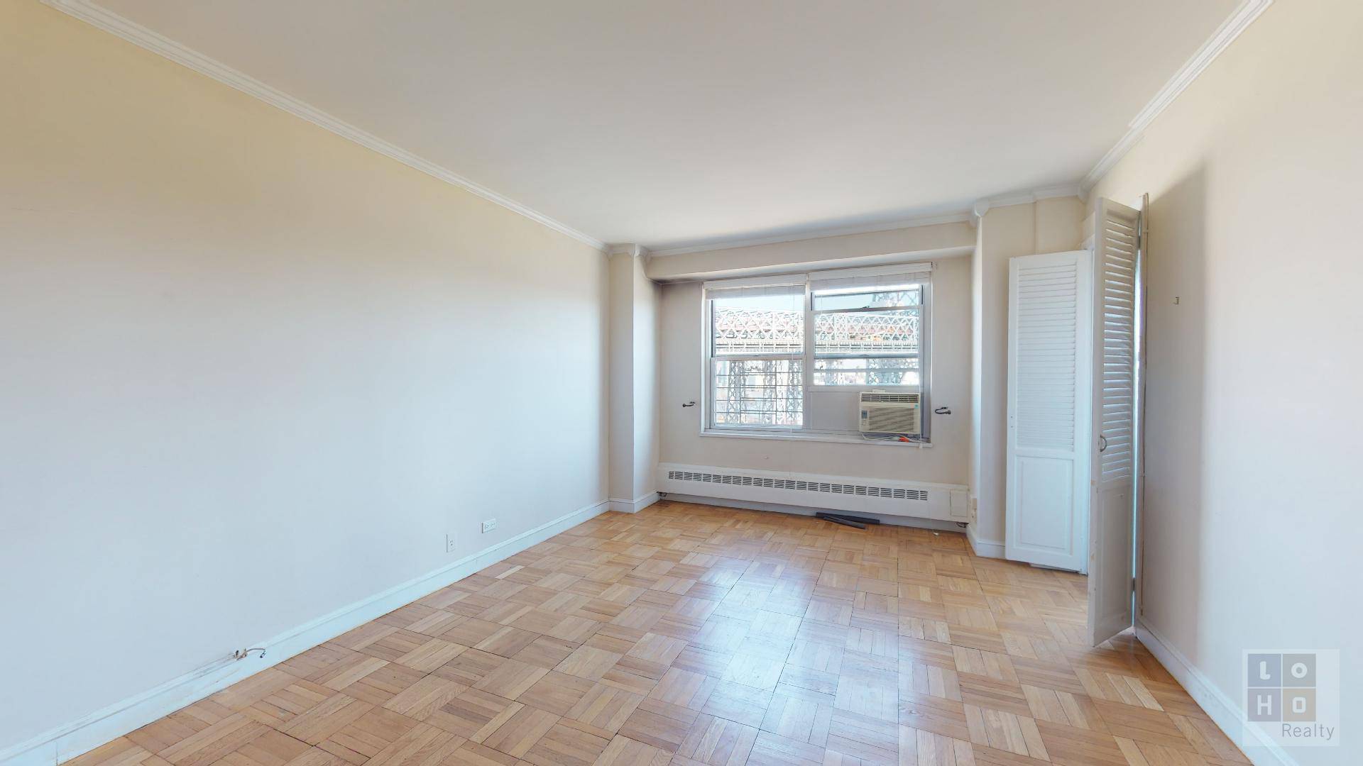 Renovated one bedroom with balcony apartment featuring direct views of the East River and Williamsburg Bridge !