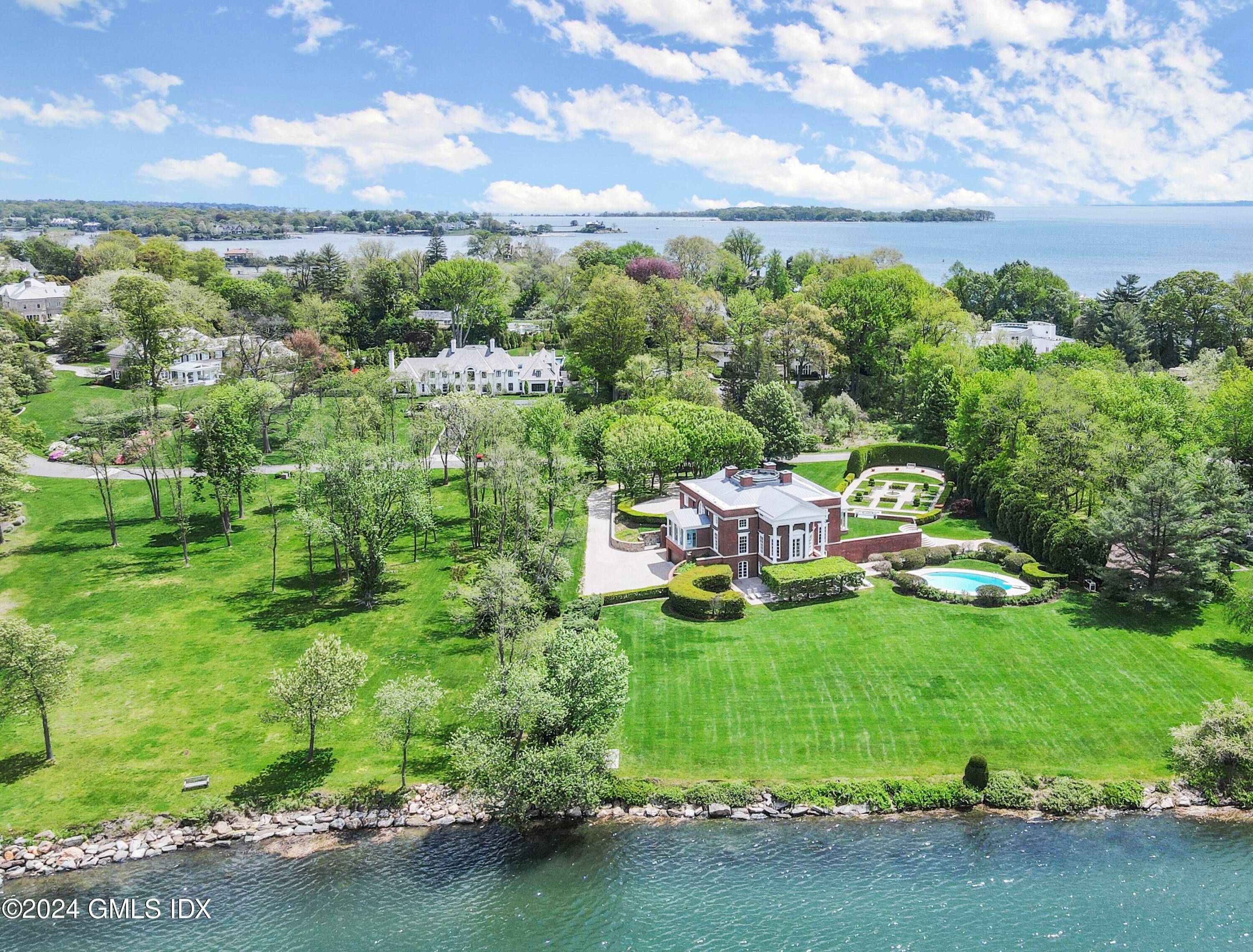 Regal waterfront estate in coveted Mead Point, one of Greenwich, Connecticut's few gated communities.