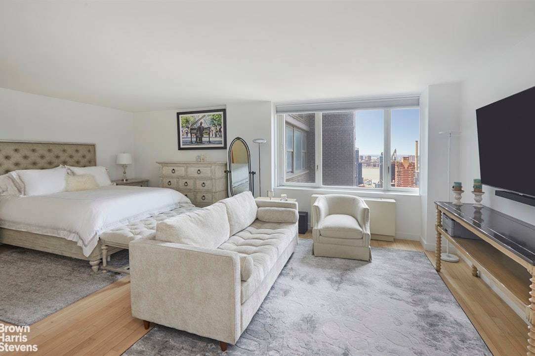 A Large 661 SF Alcove Studio is located in the top notch full service condominium in Columbus Circle.