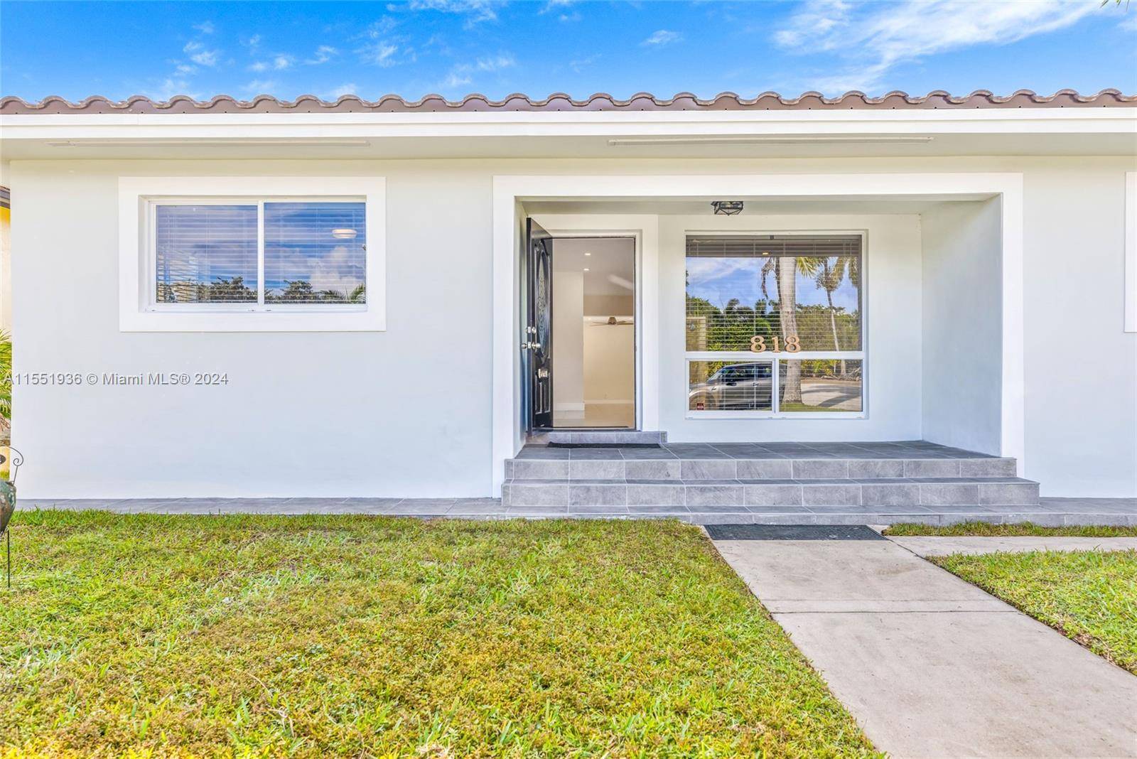 Just a five minute stroll to the beach, this impeccably remodeled 4 bedroom home exudes sophistication at every turn.