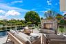 View of patio / terrace with an outdoor living space with a fireplace