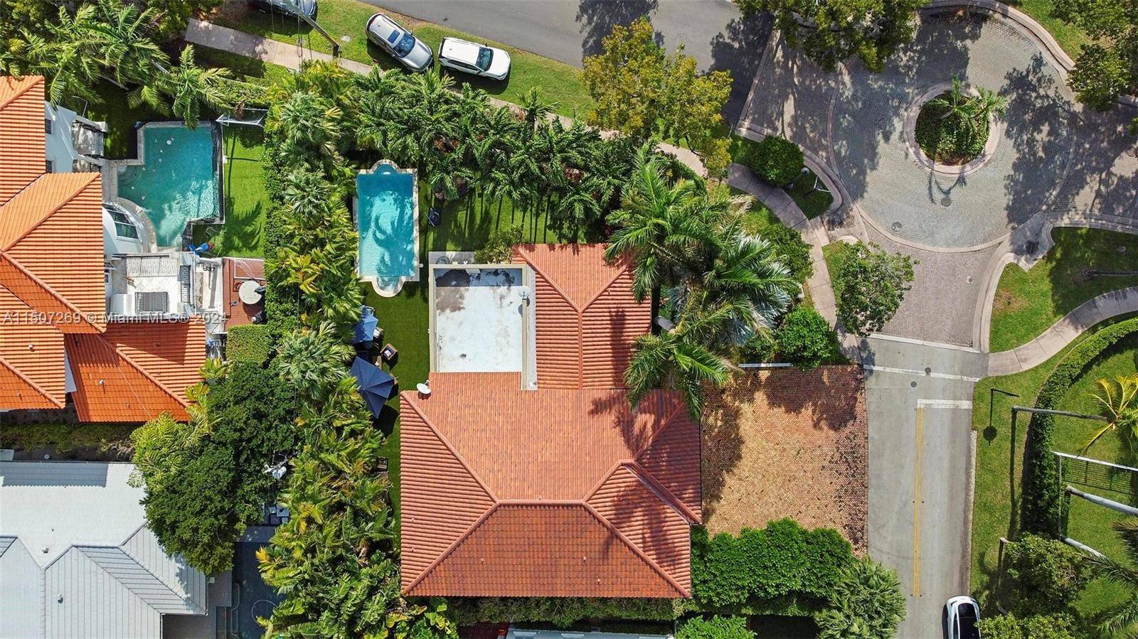 BEAUTIFUL FULLY FURNISHED 2 STORY HOME WITH 5 BEDROOMS, 5 BATHS AND 1 CAR GARAGE IN VERY DESIRABLE AREA OF KEY BISCAYNE.