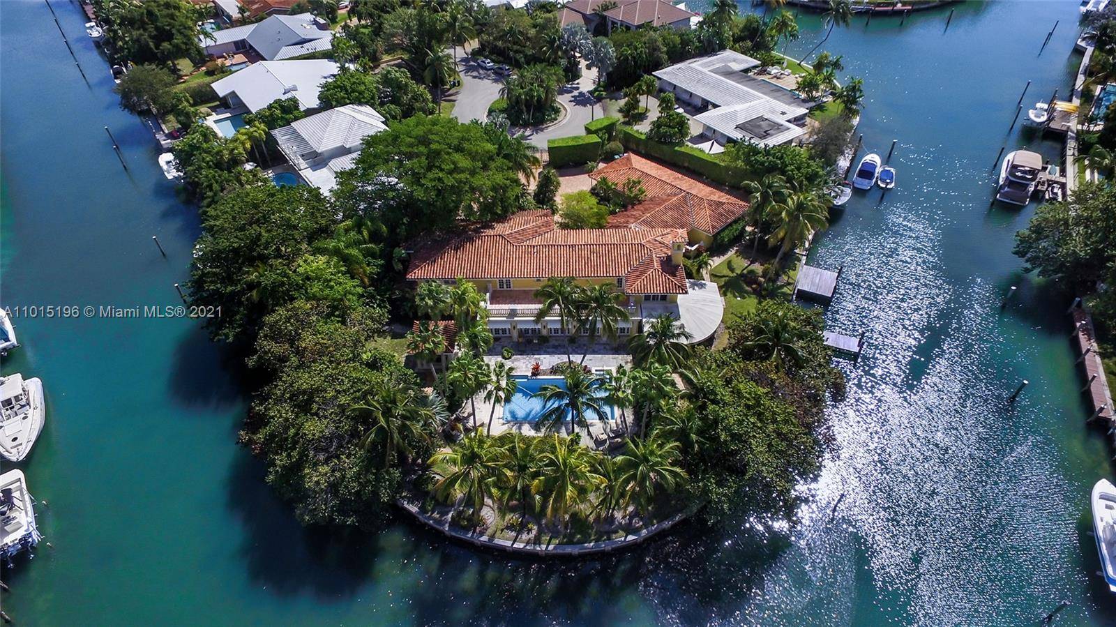 Living on the edge has a new meaning with 327 ft of incredibly lush waterfront views showcasing this secluded, private tropical peninsular estate.