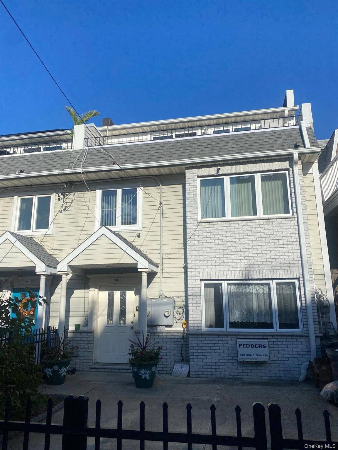 Coastal 2 Family Gem with Ocean Views amp ; Income Potential.