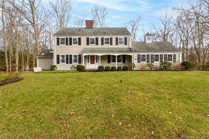 Welcome home to this classic colonial at end of a desirable cul de sac on a beautiful 1.